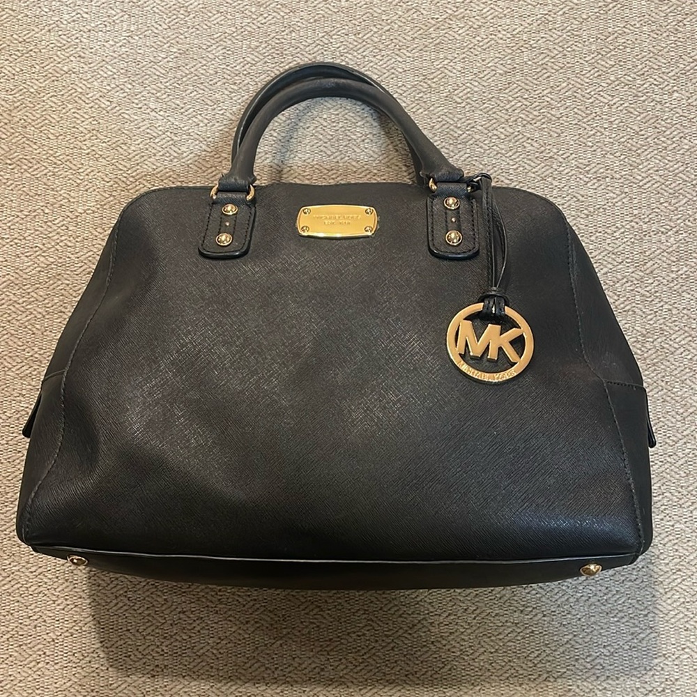 Michael Kohrs black leather handbag